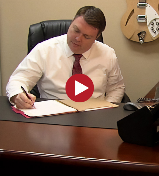 lawyer sitting at a desk